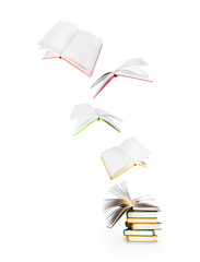 stack of books and flying books isolated on white