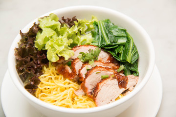  Peking Duck noodle soup in a white bowl