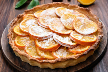 Fruit pie with orange caramelized slices