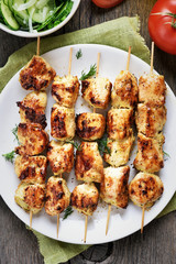 Grilled chicken on bamboo skewers