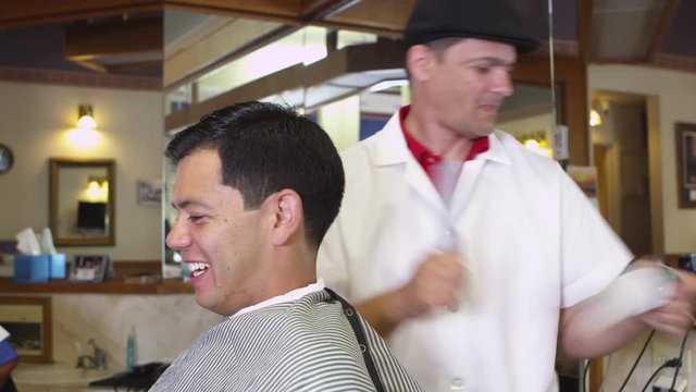 Man getting haircut at barber shop