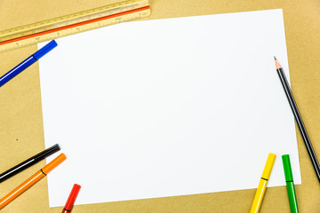 White blank paper and color writing tools , copy space for backg