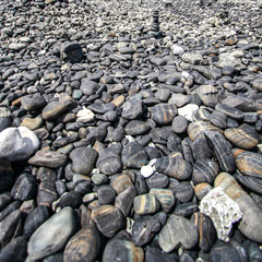 Colorful pebbles at beautiful rock island, called Koh Hin Ngam, at Andaman sea near Lipe island, Thailand
