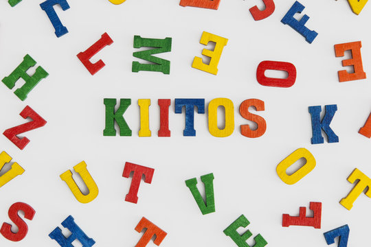 Series "Thank you": word thank you in Finnish  "Kiitos" in wooden letters on white background
