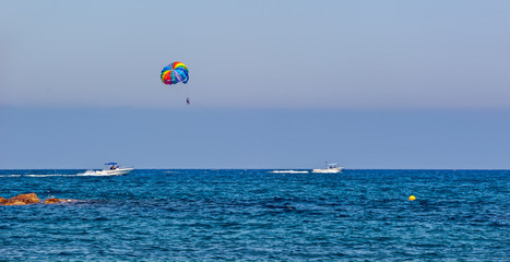 Fototapeta na wymiar Parasailing water sport, Cyprus