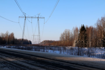 Fototapeta premium Road in snow in cold winter day