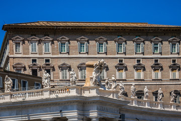 Fototapeta premium Fragment of colonnade of St. Peter's Basilica in Vatican City.