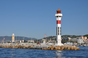 Fototapeta na wymiar Lighthouse in Port Le Vieux in Cannes France