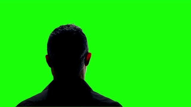 witness  criminal being interviewed green screen keyed silhouette back view