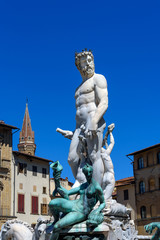 Fototapeta na wymiar fountain of Neptune in Piazza della Signoria, Florence, italy