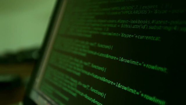 Green html code sliding on screen with black background