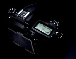 Professional modern DSLR camera - detail of the top LCD with set