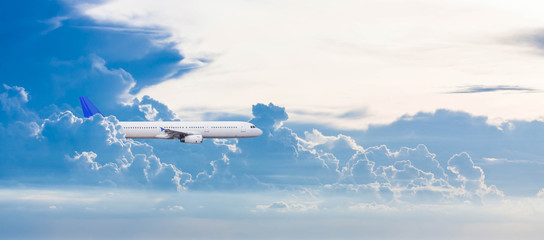 Fototapeta na wymiar Airplane with background of cloudy sky, exploration conceptual