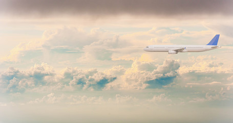 Airplane with background of cloudy sky, exploration conceptual