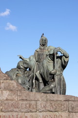 Fototapeta na wymiar Statue of Saint Francis in St. John Lateran square of Rome, Italy