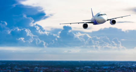 Airplane with background of cloudy sky, exploration conceptual