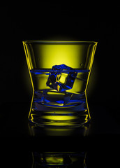 Drink in bar on color abstract background