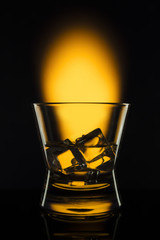 Drink in bar on color abstract background