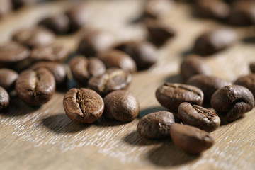 coffee beans on oak wood background