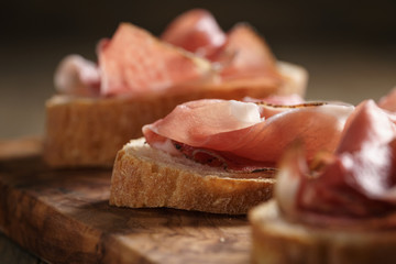 simple ciabatta slices with speck ham
