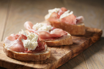 simple ciabatta slices with speck and mozzarella
