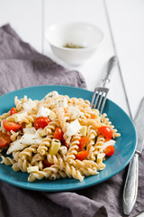 Pasta with cherry tomatoes mozzarella and avocado