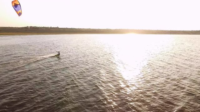 Aerial view of parasailing in lake.