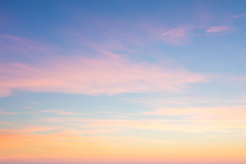 Background of sunrise sky with gentle colors of soft clouds - obrazy, fototapety, plakaty