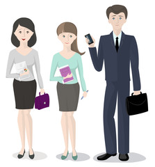 A team of three people , office workers , a man and two women st