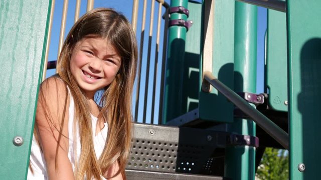 Portrait of girl on playground