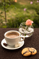 cup of coffee on table in cafe; Morning light
