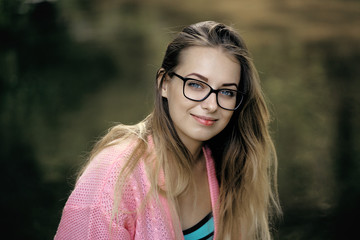 close-up portrait of a girl in pink