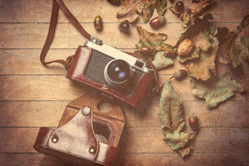 camera and fallen leaves