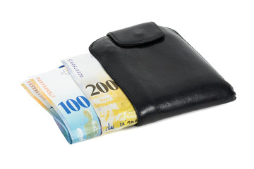 Swiss franc banknotes in black wallet isolated on white