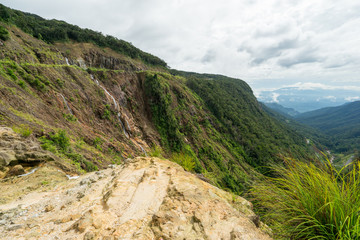 View of the slopes of mountains and rivers which are flowing down to the jungle