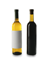 Bottles of white and red wine isolated on white