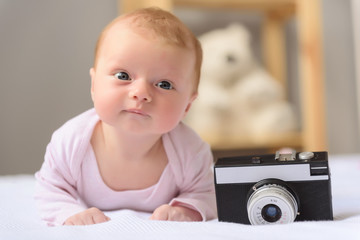 Happy-looking baby posing for camera