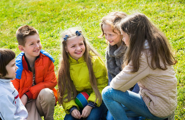 Fototapeta premium Group of children laughing in spring park