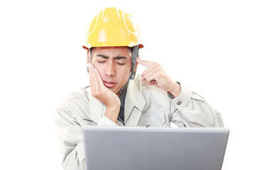 苦悩する労働者