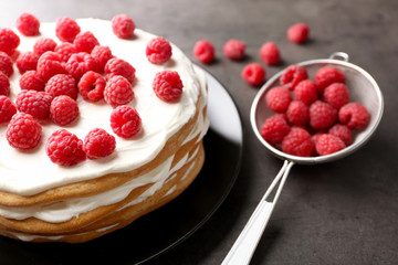 Tasty raspberry cake on grey background, closeup