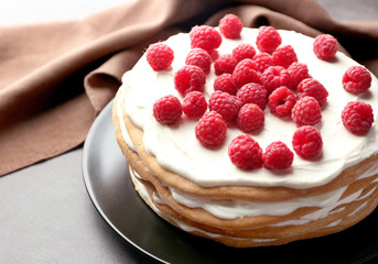 Tasty raspberry cake on plate, closeup