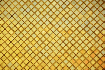 Golden tiles mosaic background.