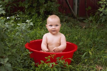 Baby in a washbowl