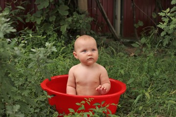 Baby in washbowl