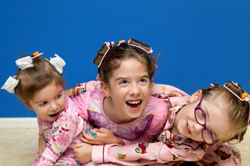 Three Sisters In Curlers Being Silly