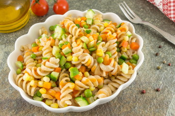 macaroni served with cheese vegetables and parsley