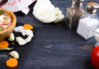 Borsch in a bowl with seasonings