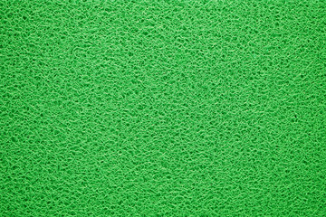 Green doormat texture background.