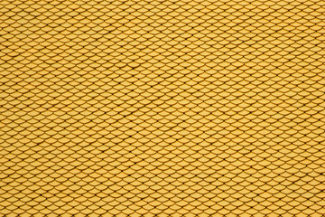 Yellow seamless roof tiles background.