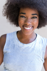 Laughing African American woman with an afro hairstyle